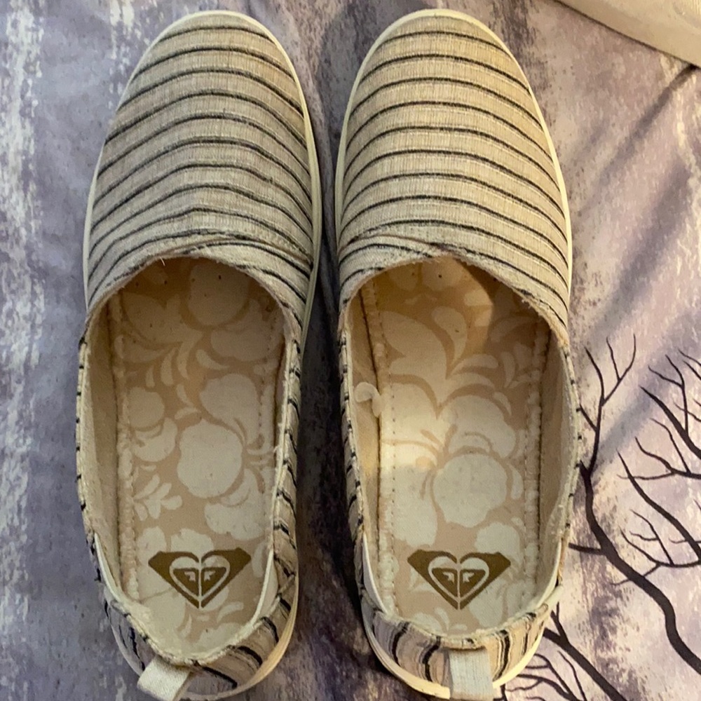 Darker beige/cream with navy stripes